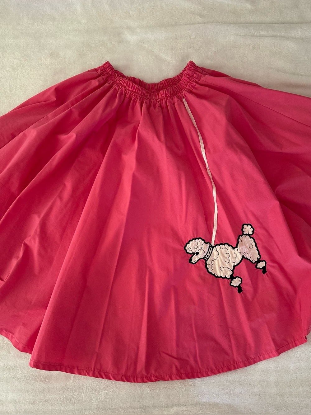 Girls pink poodle skirt